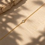צמיד מעוין זהב בשיבוץ זרקון